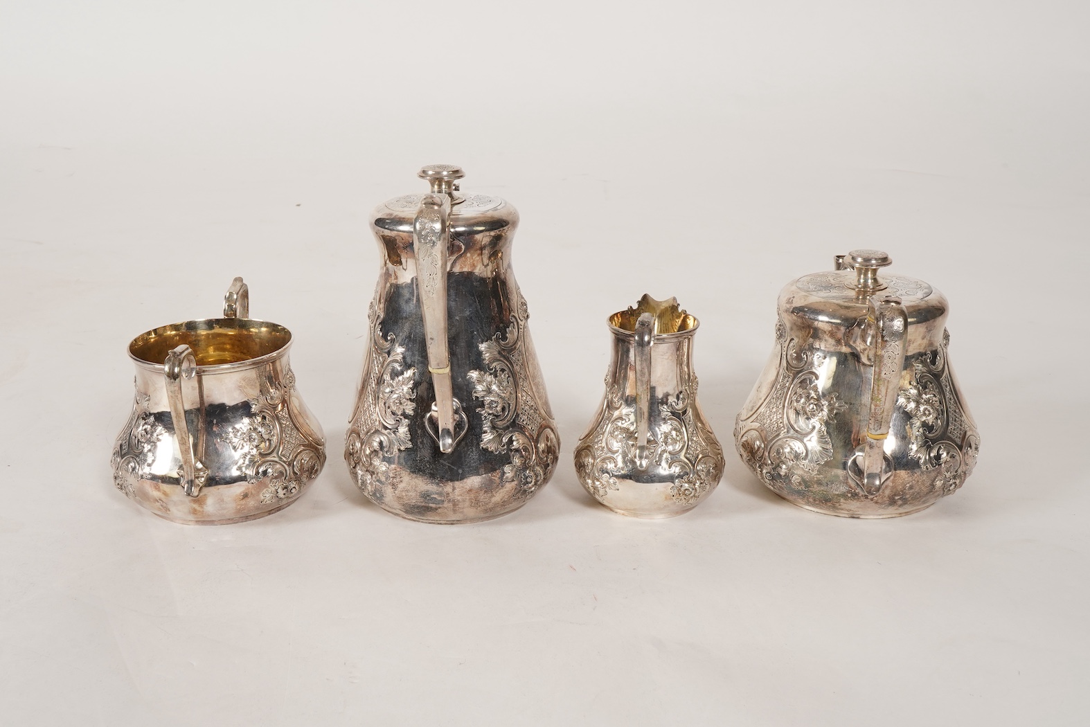A Victorian embossed silver four piece tea and coffee service by Daniel & Charles Houle